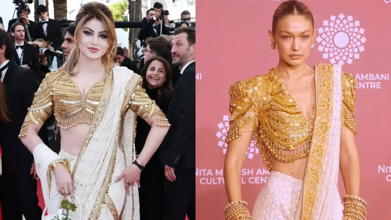 Urvashi Rautela copies Gigi Hadid
Urvashi Rautela faces backlash at Cannes 2026 for wearing an ivory-gold saree look similar to Gigi Hadid’s NMACC outfit, sparking heavy online trolling. Urvashi Rautela copies Gigi Hadid
Urvashi Rautela faces backlash at Cannes 2026 for wearing an ivory-gold saree look similar to Gigi Hadid’s NMACC outfit, sparking heavy online trolling.